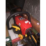 A Home Lite petrol chain saw 33cc engine