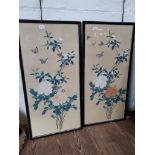 A pair of mid 20th century Japanese paintings on silk depicting flowers and butterflies, 83cm x