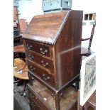 A mahogany bureau.