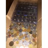 A collection of world coins including 8 plastic sheets