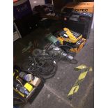 A quantity of power tools including jack hammer, angle grinder, rotary tool cutters, multitool