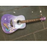 A Hanna Montana guitar by Disney