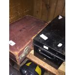 A metal box and a small (Masonic?) suitcase with initials