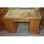 A late Victorian pedestal desk, width 122cm, depth 66cm & height 74.5cm.