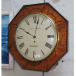 A 19th century bird's eye maple octagonal wall clock, the 12" dial painted with Roman Numerals and