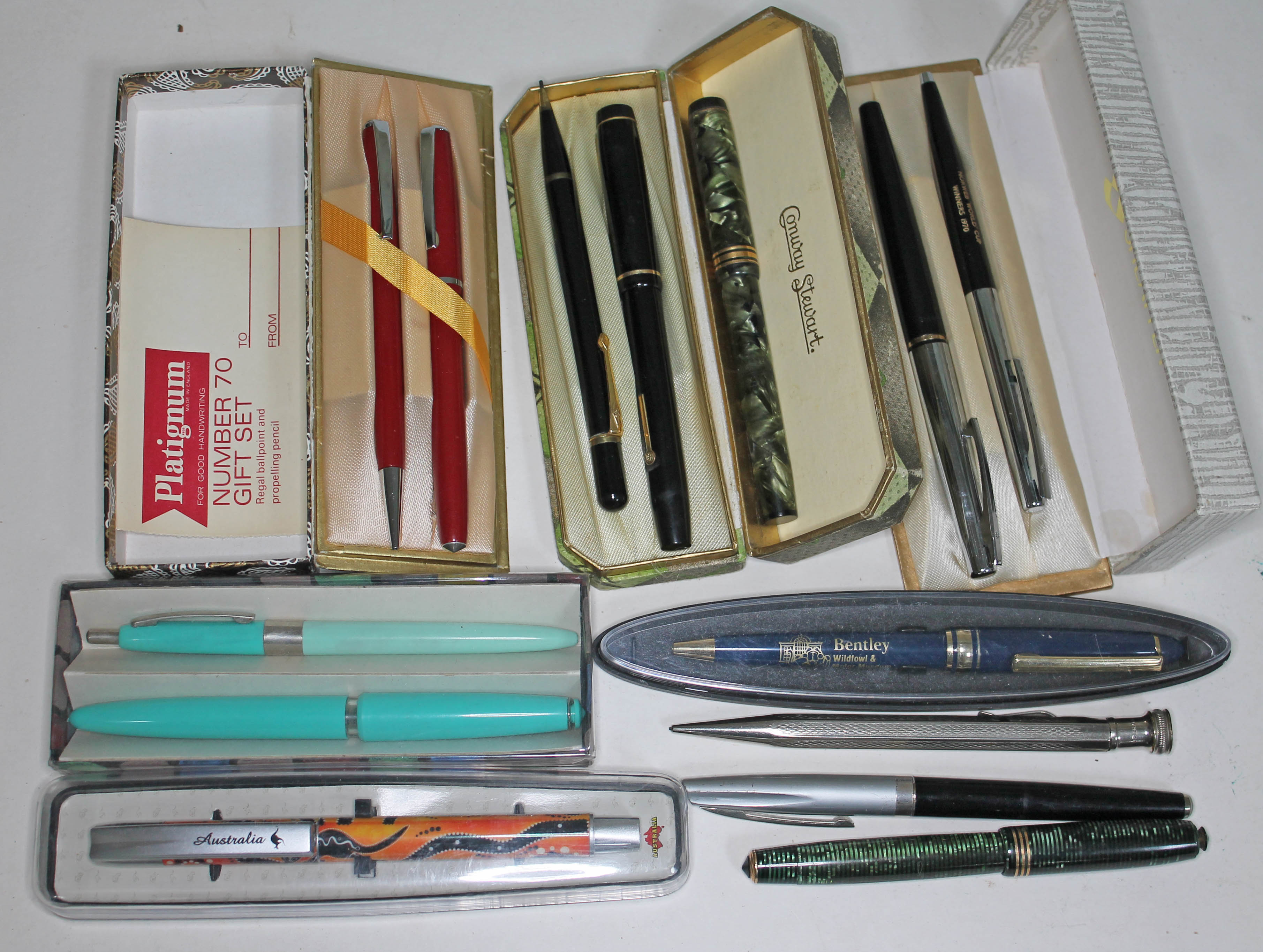 A quantity of vintage pens and pencils including two fountain pens with nibs marked 14ct.