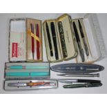 A quantity of vintage pens and pencils including two fountain pens with nibs marked 14ct.
