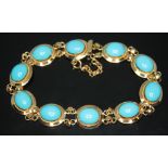 An Italian bracelet set with turquoise coloured cabochons, marked 750, length 19cm, gross wt. 15.