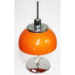 A Harvey Guzzini Faro adjustable table lamp with space age orange plastic shade, Harvey Guzzini