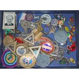 A mixed lot comprising pin badges, military badges and Masonic type items.