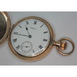 A 1911 gold plated Waltham pocket watch having signed white enamel dial with Roman numerals, spade