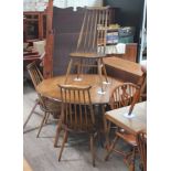 An Ercol Golden Dawn drop leaf table and five chairs. Condition - very good, minor wear only.