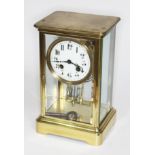 A French late 19th century four glass mantle clock, height 25cm.