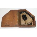 A WWII cased clinometer.