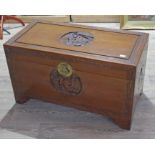 A good quality Chinese shipping chest, circa 1930s, of typical form with carved exterior and camphor