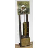 An early 20th century brass and oak water clock, height 79.5cm.