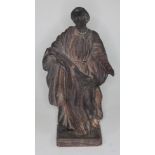 A religious wood carving depicting a male figure with robe and holding out hand, height 24cm.