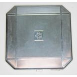 A George V Art Deco silver compact, Crisford & Norris, Birmingham 1934, 8cm x 8cm. Condition - good,