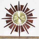 A retro sunburst clock, diam. 54cm.