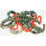 A mixed lot of bead necklaces comprising moss agate, coral, nephrite jade and another green bead