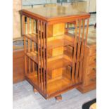 A light oak revolving bookcase circa 1900, height 113.5cm.