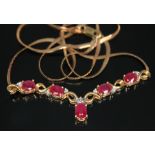 A 9ct gold ruby and diamond necklace, the cluster length 52mm, chain length 45cm, 9ct gold import