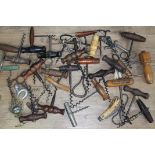 Approx. 42 corkscrews and bottle openers, 19th century and later and a horn handled penknife.