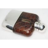 A miniature silver plated hip flask, length 11cm.