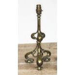 An Arts & Crafts brass table lamp, height 36cm.