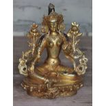 A Tibetan gilt bronze depicting the goddess Tara, height 20cm.