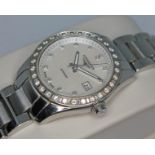 A Longines Conquest Classic stainless steel, diamond and mother of pearl ladies wristwatch, ref.L2.