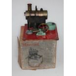 A Mamod stationary steam engine with box.