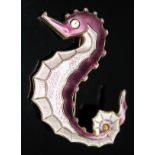 A Norwegian silver gilt and enamel brooch formed as a seahorse with pink and purple basse-taille
