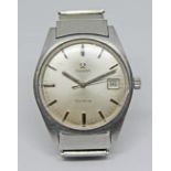 A 1969 Omega Genéve ref.136.041 stainless steel wristwatch having champagne signed dial, baton hands