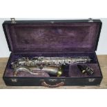 A silver plated C melody saxophone by Elkhart, with hard case.
