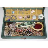 A mixed lot comprising mainly costume jewellery including beads, brooches etc. together with a
