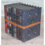 A Huntley & Palmers biscuit tin modelled as a bundle of books, length 16cm.