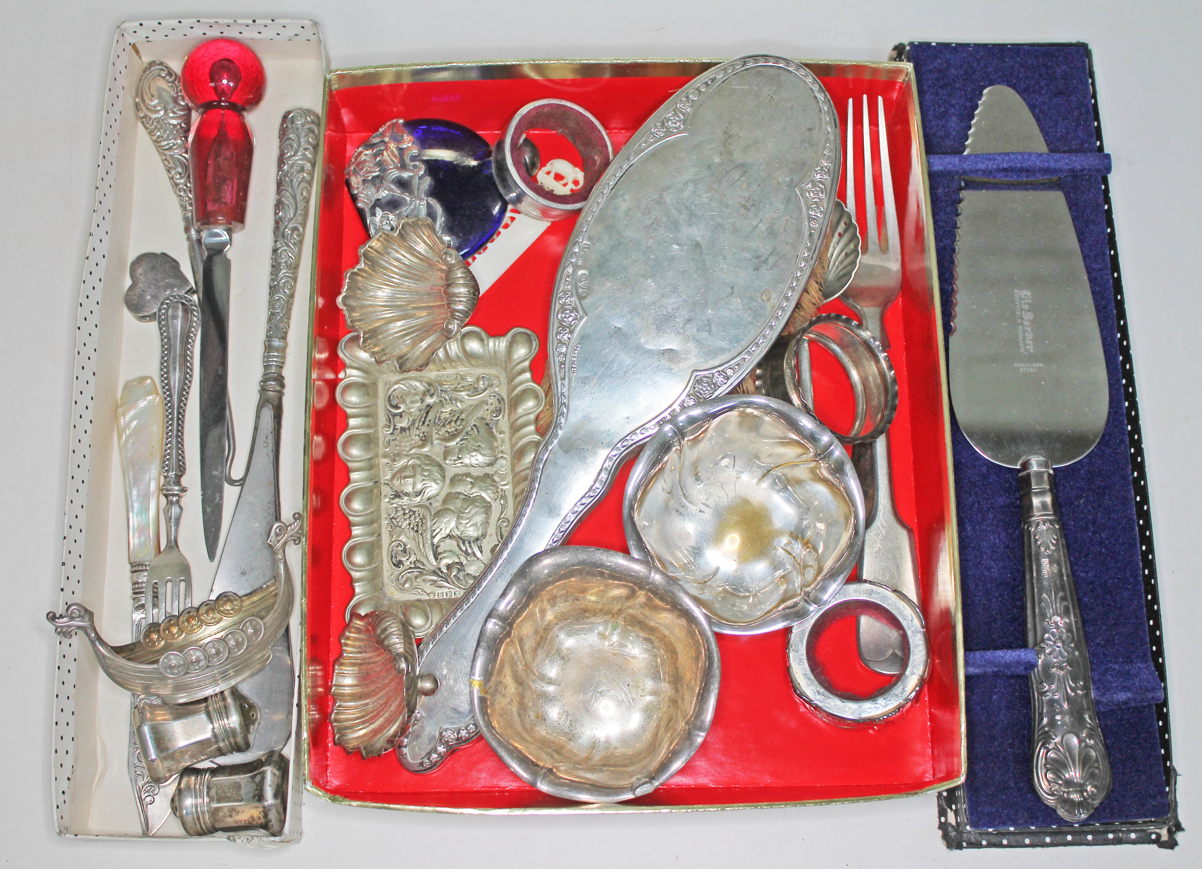 A mixed lot of hallmarked silver including a pair of half clam salts, various silver handled