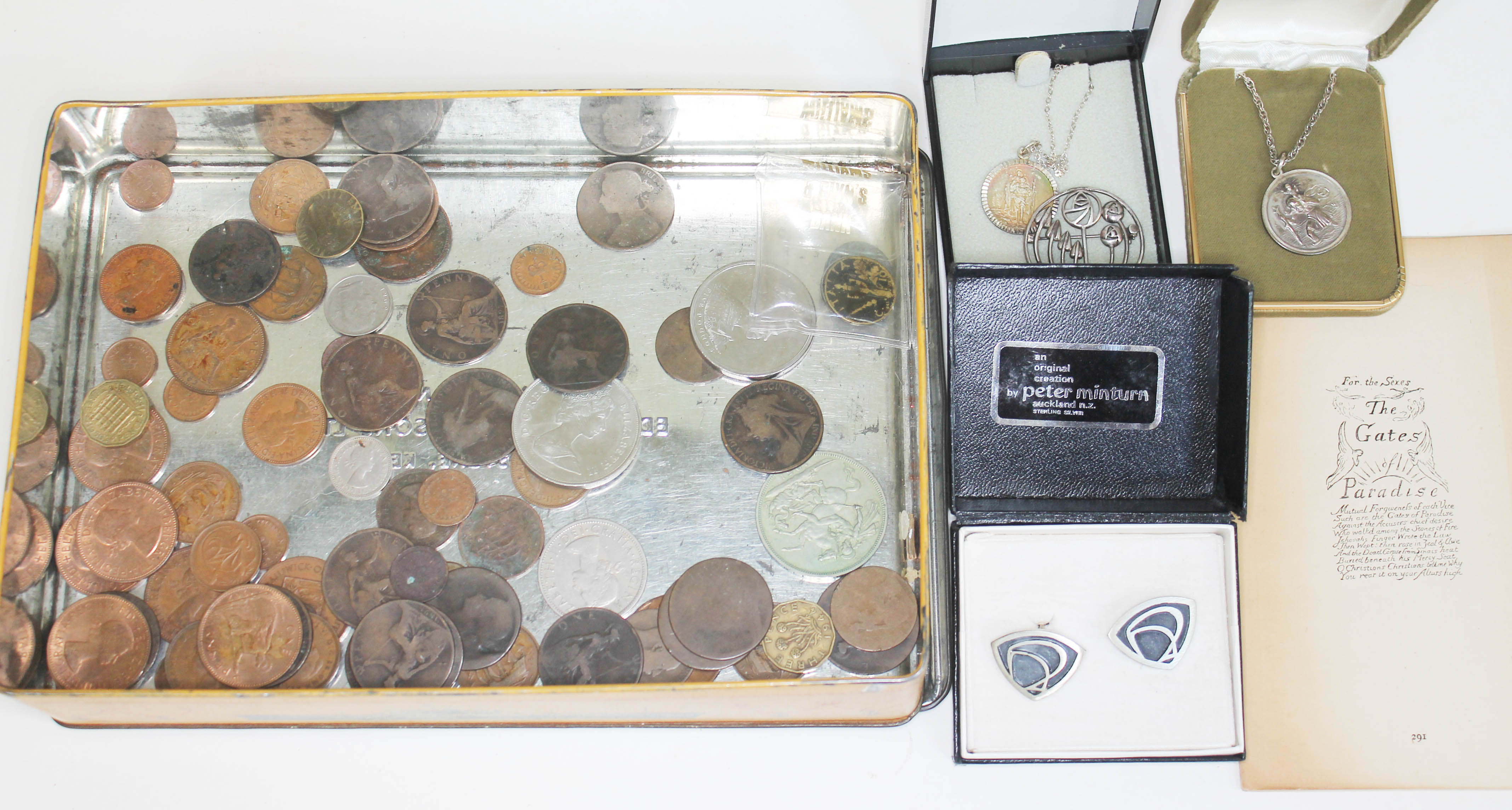 A mixed lot comprising various coins, two silver St Christopher medallions, a pair of Peter