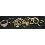 Four hallmarked 9ct gold rings, together with various earrings marked 9ct or 375, gross wt. 10.19g.