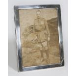 A silver photography frame, Mappin & Webb, Sheffield 2001, 17.5cm x 22.5cm.