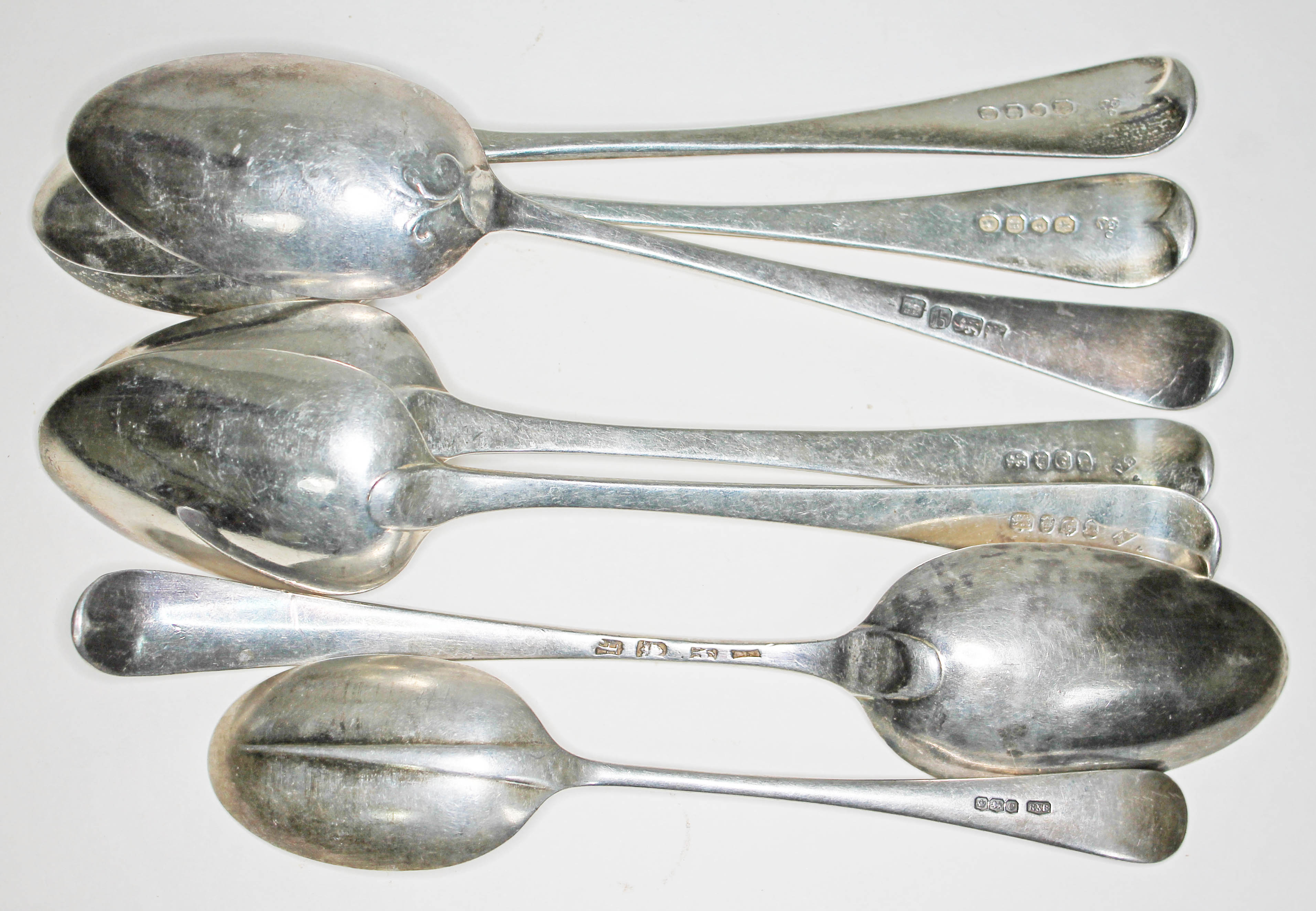 Seven silver spoons, various makers George II and later, lengths 17.5cm to 21.5cm, gross wt. 14oz.