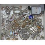 A box of mainly white metal jewellery.