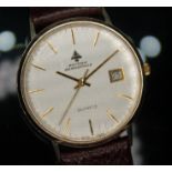 A 9ct gold 1980s British Aerospace presentation quartz wristwatch having signed silver dial, gold