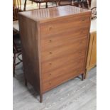 A Danish style teak chest of drawers with brass knobs, width 84cm, depth 46cm & height 115cm.