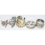 A group of eight hallmarked silver and white metal rings including two Art Nouveau style.