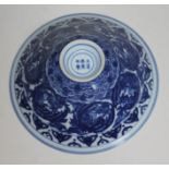 A Chinese porcelain bowl, decorated in blue and white with birds, bearing six character Kangxi mark,