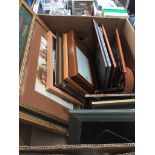 A box of pictures and frames