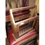 A rustic hardwood magazine rack.