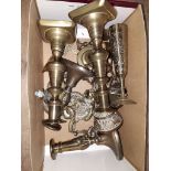 Two pairs of brass candlesticks and other brass ware.